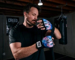 TITLE Boxing Defender Sublimated Glove Wraps -Power Punch KSGWBKGX 1